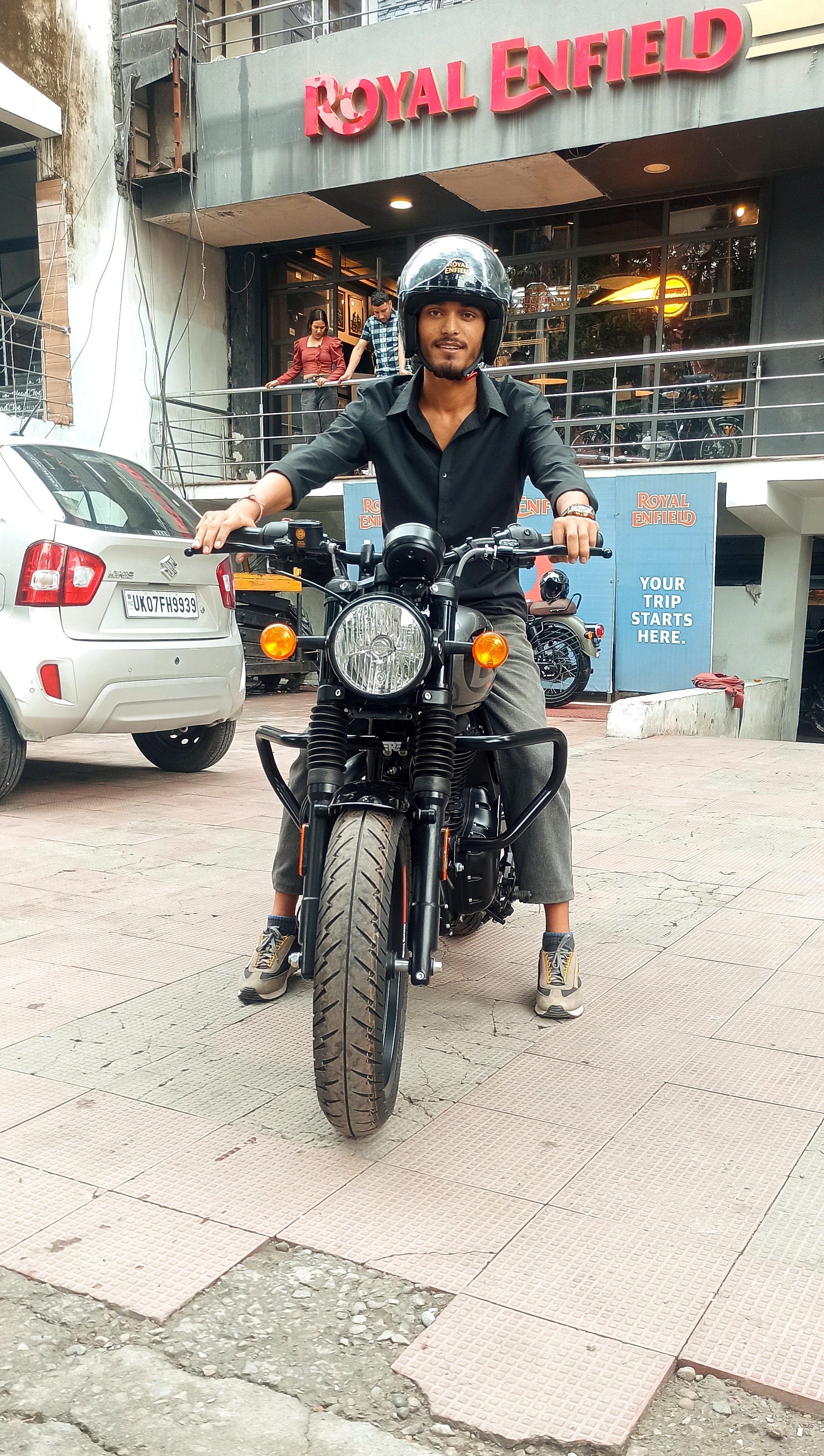 Karan Rawat riding his Royal Enfield motorcycle